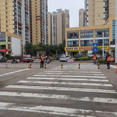 长流镇长流墟社区网格志愿服务队开展交通文明劝导活动