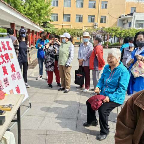 万树园社区新时代文明实践站开展免费“磨刀、理发”便民服务活动