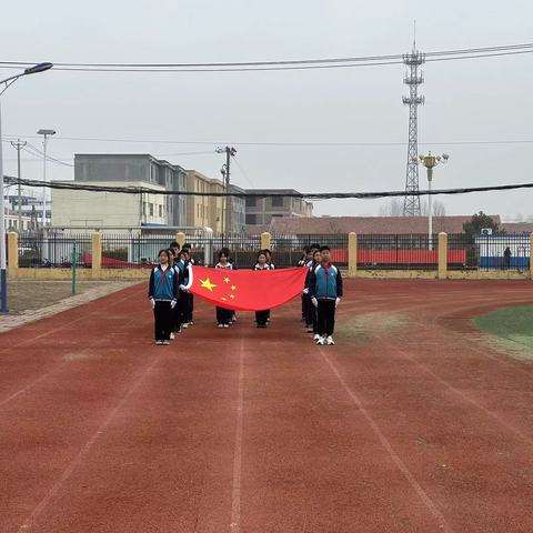 莒南县文疃镇中心小学举行“拥抱春天，‘植’此青绿”植树节主题升旗仪式