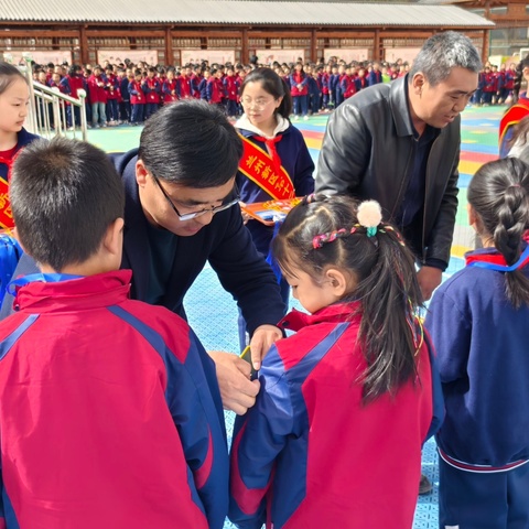 筑牢安全防线，争做文明少年 ——兰州新区第十二小学“路队长” “安全员”授牌仪式